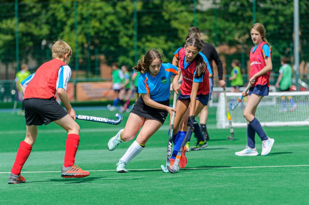Spider Hockey camp players in action on the pitch